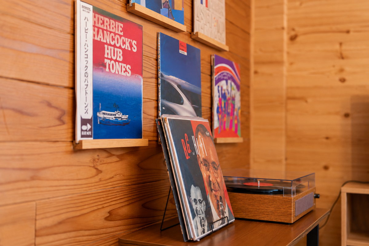 Record sleeves on the wall and the turntable
